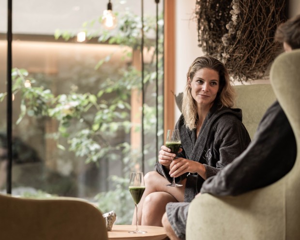 A couple is relaxing at the adults-only spa at the children's hotel in South Tyrol.