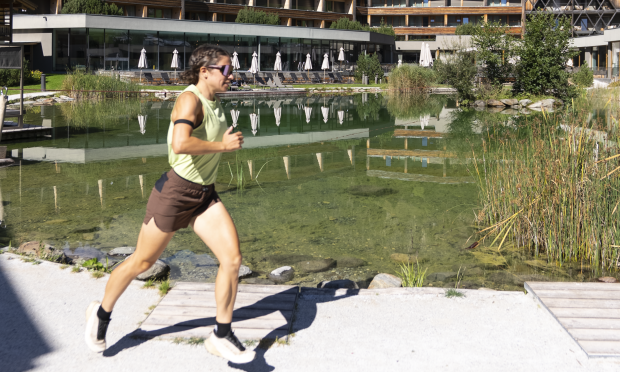 Severine runs a lap through the Feuerstein garden.