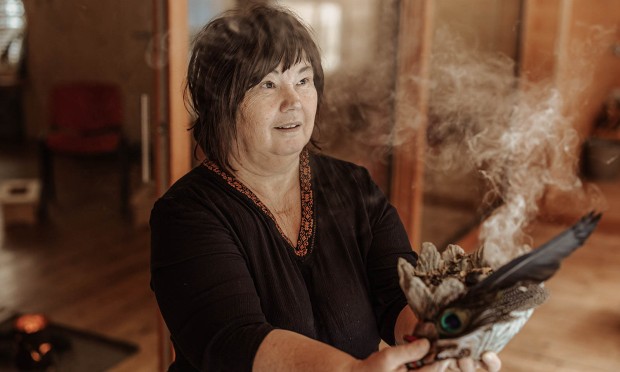 Woman performing an incense meditation
