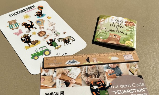 25 Years Feuerstein Goodie by Wunderwunsch with sticker sheet, ruler, Pixi book, and voucher