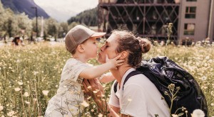 Children with mother in a flower meadow