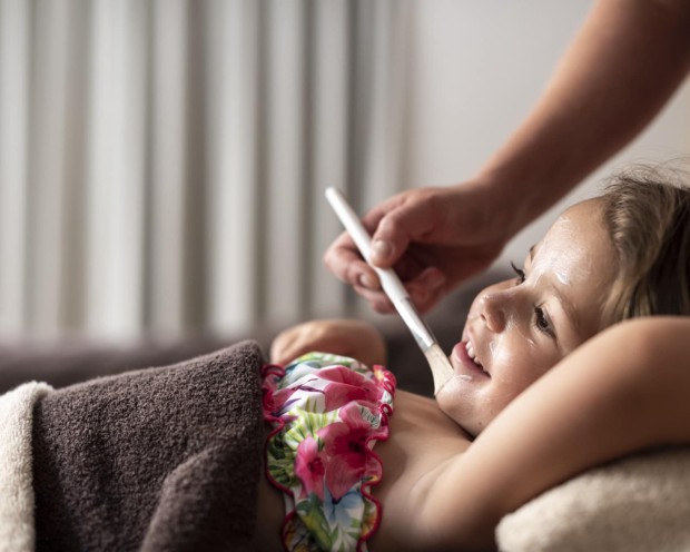 Child undergoes a massage