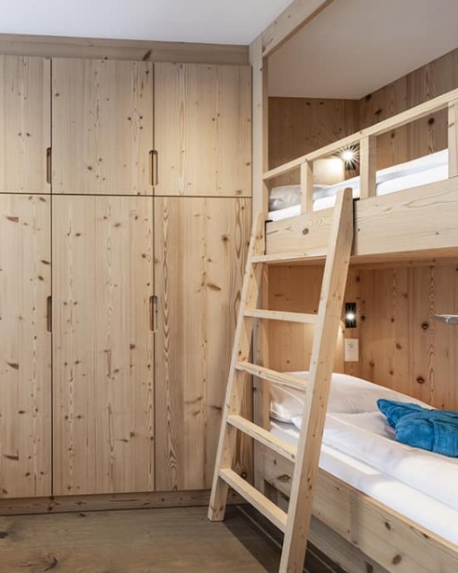 Children's room with wooden wardrobe