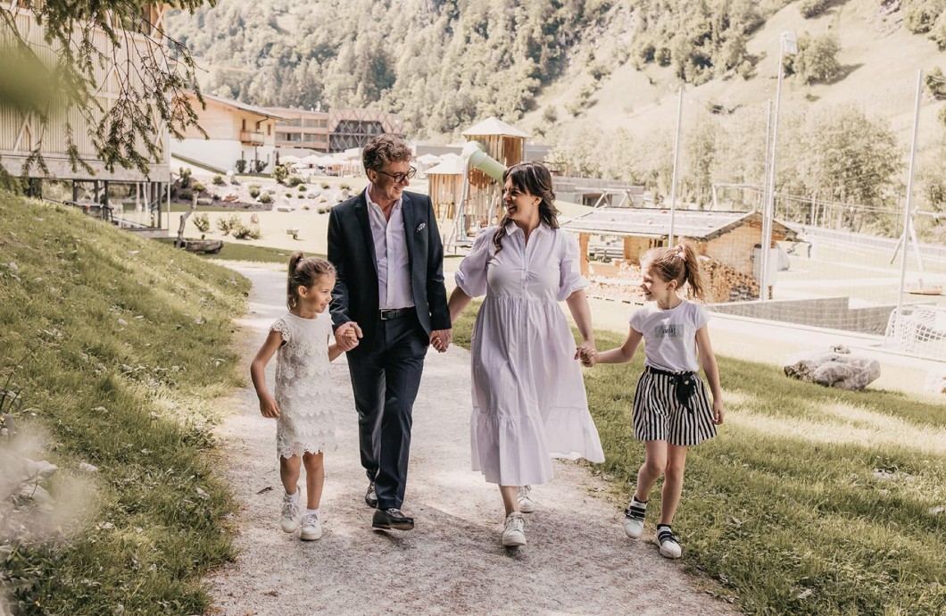 Host family takes a walk in the hotel garden