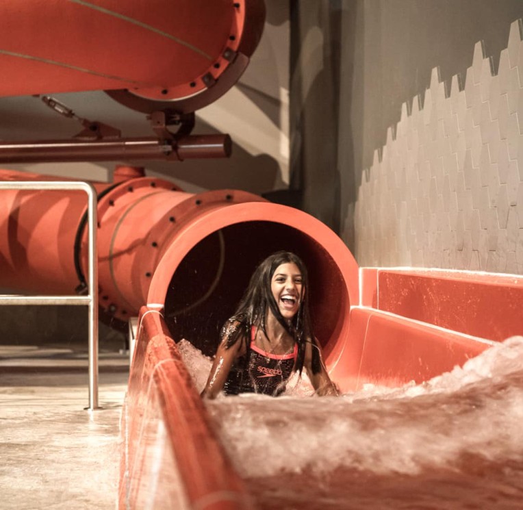 The giant speed slide with professional stopwatch at the family spa hotel Feuerstein in South Tyrol