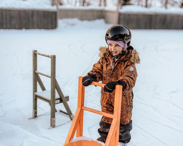 Ice skating in the garden of the Feuerstein family hotel, the ideal place for a family holiday in the mountains